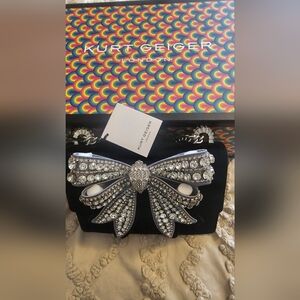 Kurt Geiger Black Clutch with Silver Bow